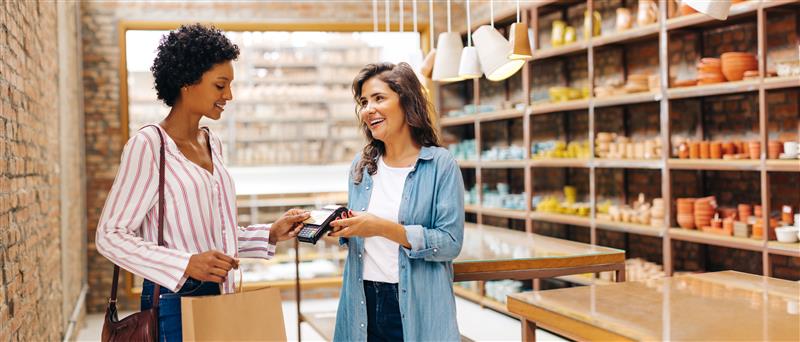 A woman making a retail payment